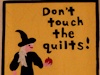 Don't touch the quilts sign
