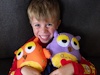 Leo with two stuffed owls