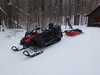 Snowmobile and trailer