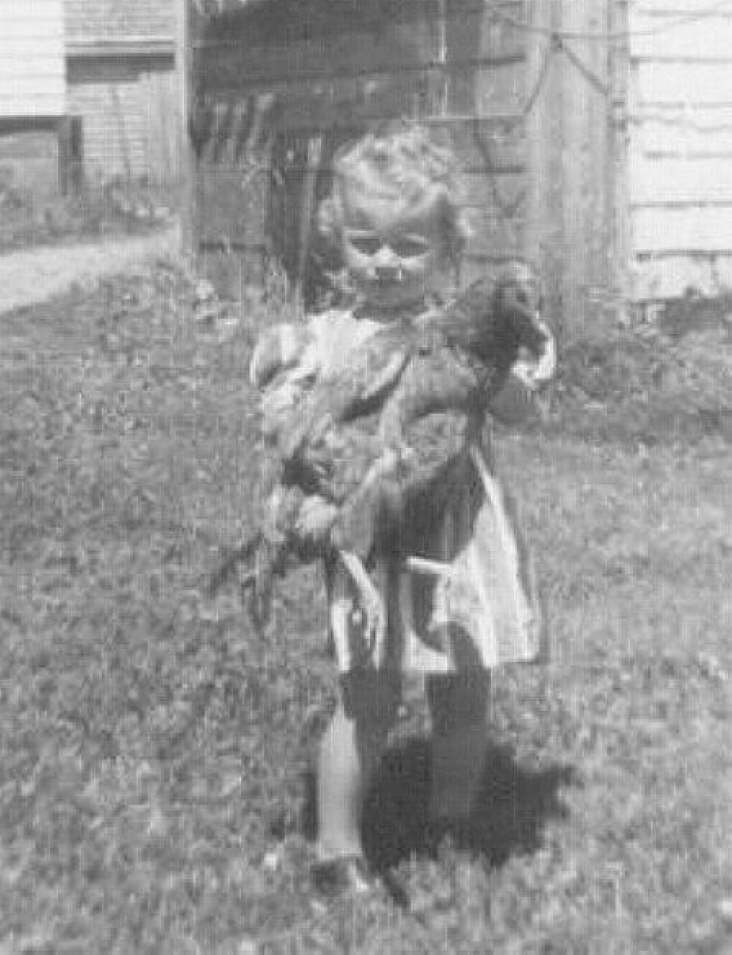 Myrna with pet hen