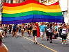 Large rainbow flag at the 2014 Pride Parade