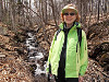 Elaine at a mountain stream