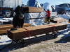 loading lumber onto carts