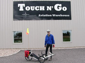 Adam and his Catrike Speed at the Touch 'n Go Aviation Warehouse, Carp Airport