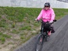 Kathryn riding her bike