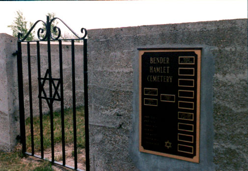 Gate and plaque at the cemetery